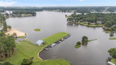 Welcome to your dream home nestled in the gated Carolina Lakes on Carolina Lakes Country Club in North Carolina - for sale on GolfHomes.com, golf home, golf lot