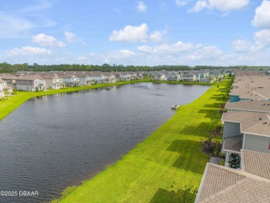 You'll love coming home to this stunning 2023-built waterfront on Venetian Bay Golf Course in Florida - for sale on GolfHomes.com, golf home, golf lot