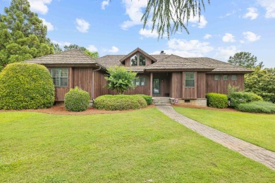 Experience breathtaking lake views from this charming 3-bedroom on The Golf Club at Cuscowilla in Georgia - for sale on GolfHomes.com, golf home, golf lot
