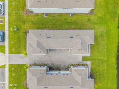 You'll love coming home to this stunning 2023-built waterfront on Venetian Bay Golf Course in Florida - for sale on GolfHomes.com, golf home, golf lot