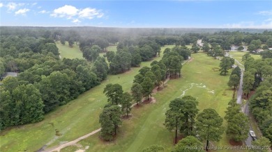 Welcome to your dream home nestled in the gated Carolina Lakes on Carolina Lakes Country Club in North Carolina - for sale on GolfHomes.com, golf home, golf lot