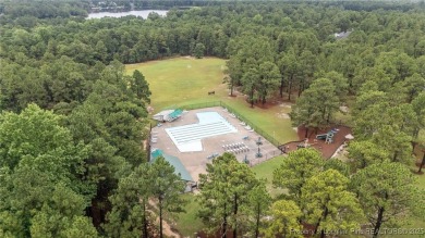 Welcome to your dream home nestled in the gated Carolina Lakes on Carolina Lakes Country Club in North Carolina - for sale on GolfHomes.com, golf home, golf lot
