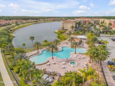 You'll love coming home to this stunning 2023-built waterfront on Venetian Bay Golf Course in Florida - for sale on GolfHomes.com, golf home, golf lot