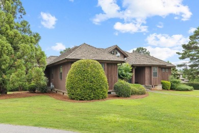 Experience breathtaking lake views from this charming 3-bedroom on The Golf Club at Cuscowilla in Georgia - for sale on GolfHomes.com, golf home, golf lot