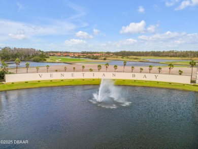 You'll love coming home to this stunning 2023-built waterfront on Venetian Bay Golf Course in Florida - for sale on GolfHomes.com, golf home, golf lot