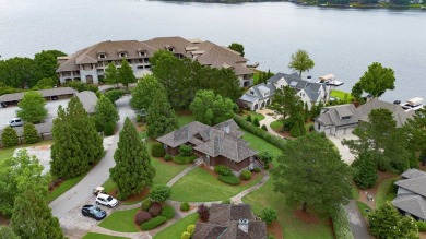 Experience breathtaking lake views from this charming 3-bedroom on The Golf Club at Cuscowilla in Georgia - for sale on GolfHomes.com, golf home, golf lot