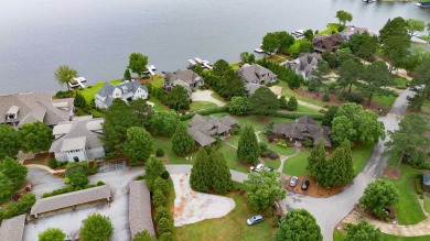 Experience breathtaking lake views from this charming 3-bedroom on The Golf Club at Cuscowilla in Georgia - for sale on GolfHomes.com, golf home, golf lot