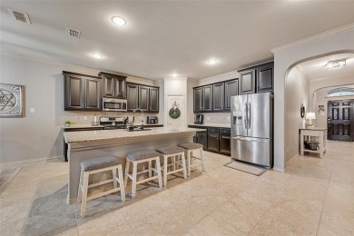 Step into this beautifully maintained showcase home, where on The Golf Club At Champions Circle in Texas - for sale on GolfHomes.com, golf home, golf lot