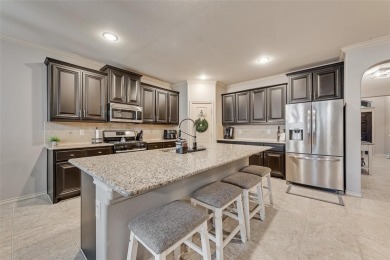 Step into this beautifully maintained showcase home, where on The Golf Club At Champions Circle in Texas - for sale on GolfHomes.com, golf home, golf lot