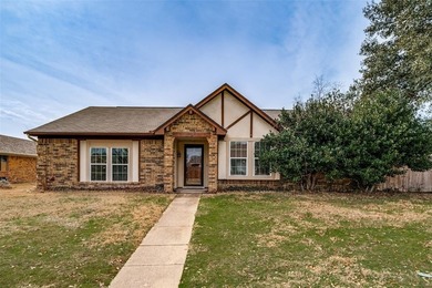 Located in the heart of Plano, this charming Tudor-style on The Courses at Watters Creek in Texas - for sale on GolfHomes.com, golf home, golf lot