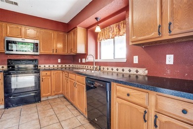 Located in the heart of Plano, this charming Tudor-style on The Courses at Watters Creek in Texas - for sale on GolfHomes.com, golf home, golf lot