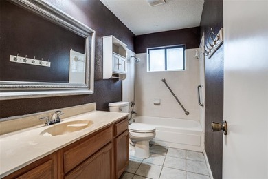 Located in the heart of Plano, this charming Tudor-style on The Courses at Watters Creek in Texas - for sale on GolfHomes.com, golf home, golf lot