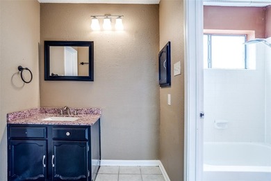 Located in the heart of Plano, this charming Tudor-style on The Courses at Watters Creek in Texas - for sale on GolfHomes.com, golf home, golf lot