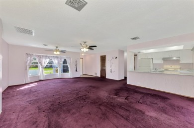 This home has only had one loving owner from the day it was on Oyster Creek Golf Club in Florida - for sale on GolfHomes.com, golf home, golf lot