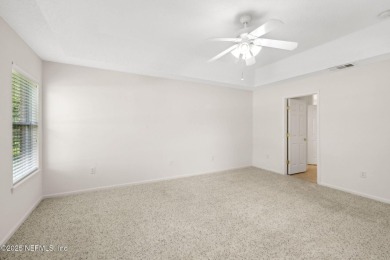 **Move in ready!** This beautifully landscaped all-brick on Magnolia Point Golf and Country Club in Florida - for sale on GolfHomes.com, golf home, golf lot