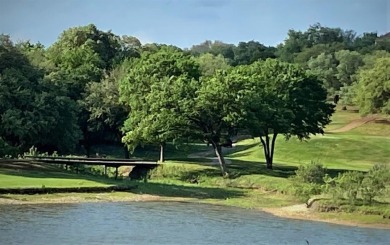 Discover this well-maintained 2-bedroom, 2-bath condo on the on White Bluff Resort - New Course in Texas - for sale on GolfHomes.com, golf home, golf lot