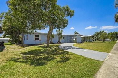 Beautifully renovated 4 bedroom single family home just minutes on Club Med Sandpiper in Florida - for sale on GolfHomes.com, golf home, golf lot
