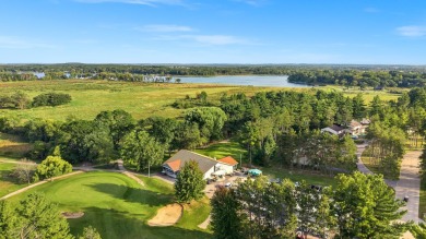 Rare turnkey investment! Includes Saddle Ridge 9-hole golf on Saddle Ridge Golf Club in Wisconsin - for sale on GolfHomes.com, golf home, golf lot