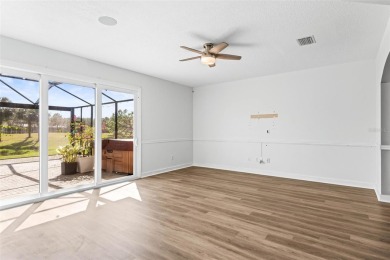 BRAND NEW FLOORING! This home boasts high-end upgrades on Heritage Isles Golf and Country Club in Florida - for sale on GolfHomes.com, golf home, golf lot