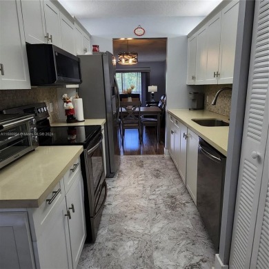 Beautifully Updated 2/2 Condo in Century Village! This 3rd Floor on Flamingo Lakes Country Club in Florida - for sale on GolfHomes.com, golf home, golf lot