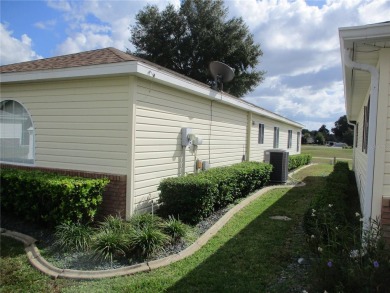 GRAB YOUR GOLF CLUBS AND YOUR TOOTHBRUSH, this 2/2/2 TURN-KEY on Preserve Golf Club in Florida - for sale on GolfHomes.com, golf home, golf lot