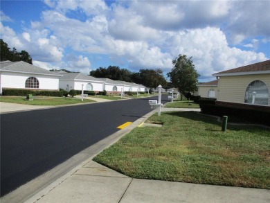 GRAB YOUR GOLF CLUBS AND YOUR TOOTHBRUSH, this 2/2/2 TURN-KEY on Preserve Golf Club in Florida - for sale on GolfHomes.com, golf home, golf lot