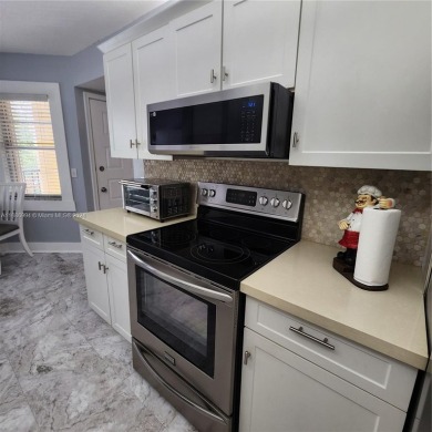 Beautifully Updated 2/2 Condo in Century Village! This 3rd Floor on Flamingo Lakes Country Club in Florida - for sale on GolfHomes.com, golf home, golf lot