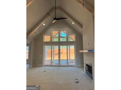 Luxury living awaits in River Forest, a premier swim, golf, and on The Club River Forest in Georgia - for sale on GolfHomes.com, golf home, golf lot