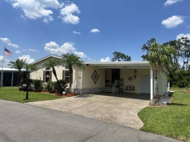 This spacious and beautiful 3-bedroom, 2 bath home features two on Four Lakes Golf Club in Florida - for sale on GolfHomes.com, golf home, golf lot