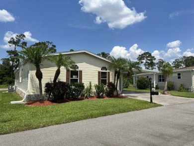 This spacious and beautiful 3-bedroom, 2 bath home features two on Four Lakes Golf Club in Florida - for sale on GolfHomes.com, golf home, golf lot