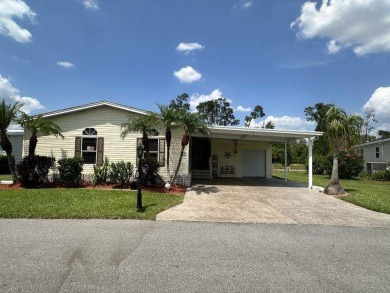 This spacious and beautiful 3-bedroom, 2 bath home features two on Four Lakes Golf Club in Florida - for sale on GolfHomes.com, golf home, golf lot