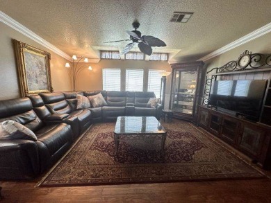 This spacious and beautiful 3-bedroom, 2 bath home features two on Four Lakes Golf Club in Florida - for sale on GolfHomes.com, golf home, golf lot