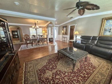 This spacious and beautiful 3-bedroom, 2 bath home features two on Four Lakes Golf Club in Florida - for sale on GolfHomes.com, golf home, golf lot