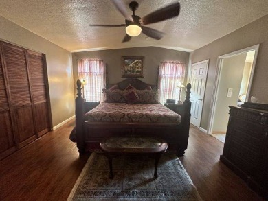 This spacious and beautiful 3-bedroom, 2 bath home features two on Four Lakes Golf Club in Florida - for sale on GolfHomes.com, golf home, golf lot