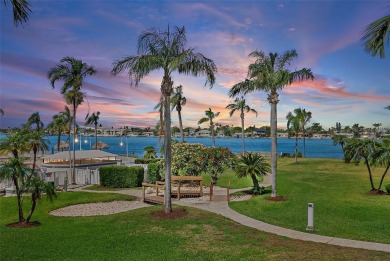 Exceptional craftsmanship and stunning upgrades make this a on Isla Del Sol Yacht and Country Club in Florida - for sale on GolfHomes.com, golf home, golf lot