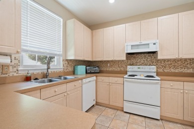Charming Townhome with Carriage House in Desirable Southwood on Southwood Golf Club in Florida - for sale on GolfHomes.com, golf home, golf lot