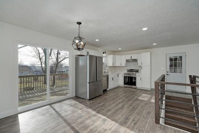 Beautifully renovated and perfectly located near Horton Smith on Horton Smith Golf Course in Missouri - for sale on GolfHomes.com, golf home, golf lot