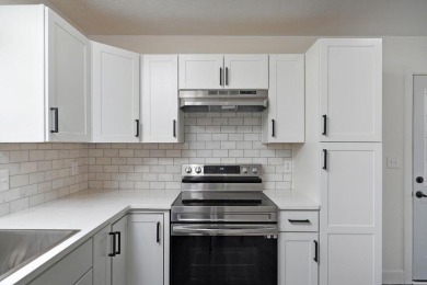 Beautifully renovated and perfectly located near Horton Smith on Horton Smith Golf Course in Missouri - for sale on GolfHomes.com, golf home, golf lot