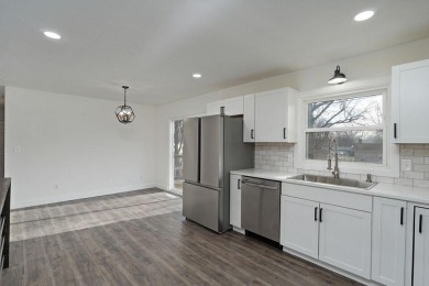 Beautifully renovated and perfectly located near Horton Smith on Horton Smith Golf Course in Missouri - for sale on GolfHomes.com, golf home, golf lot