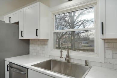 Beautifully renovated and perfectly located near Horton Smith on Horton Smith Golf Course in Missouri - for sale on GolfHomes.com, golf home, golf lot