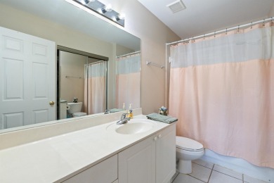 Charming Townhome with Carriage House in Desirable Southwood on Southwood Golf Club in Florida - for sale on GolfHomes.com, golf home, golf lot