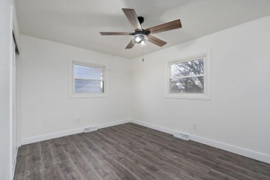 Beautifully renovated and perfectly located near Horton Smith on Horton Smith Golf Course in Missouri - for sale on GolfHomes.com, golf home, golf lot