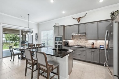 Step into resort-style living in this like-new 2 bedroom, 2.5 on Wildhorse Golf Club of Robson Ranch in Texas - for sale on GolfHomes.com, golf home, golf lot