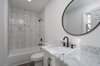 Beautifully renovated and perfectly located near Horton Smith on Horton Smith Golf Course in Missouri - for sale on GolfHomes.com, golf home, golf lot