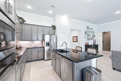 Step into resort-style living in this like-new 2 bedroom, 2.5 on Wildhorse Golf Club of Robson Ranch in Texas - for sale on GolfHomes.com, golf home, golf lot