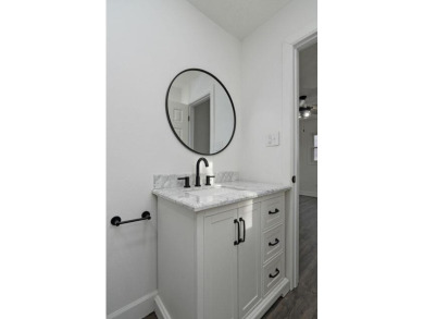 Beautifully renovated and perfectly located near Horton Smith on Horton Smith Golf Course in Missouri - for sale on GolfHomes.com, golf home, golf lot
