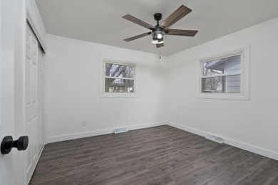 Beautifully renovated and perfectly located near Horton Smith on Horton Smith Golf Course in Missouri - for sale on GolfHomes.com, golf home, golf lot