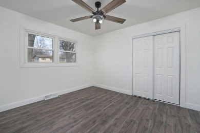 Beautifully renovated and perfectly located near Horton Smith on Horton Smith Golf Course in Missouri - for sale on GolfHomes.com, golf home, golf lot
