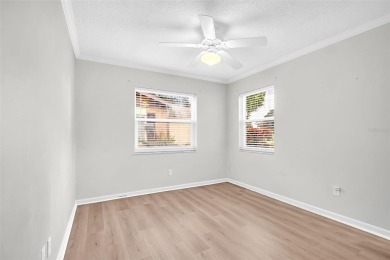 Welcome to this beautifully updated villa in Palm Harbor's on Highland Lakes Executive Golf Course in Florida - for sale on GolfHomes.com, golf home, golf lot