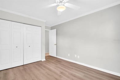 Welcome to this beautifully updated villa in Palm Harbor's on Highland Lakes Executive Golf Course in Florida - for sale on GolfHomes.com, golf home, golf lot